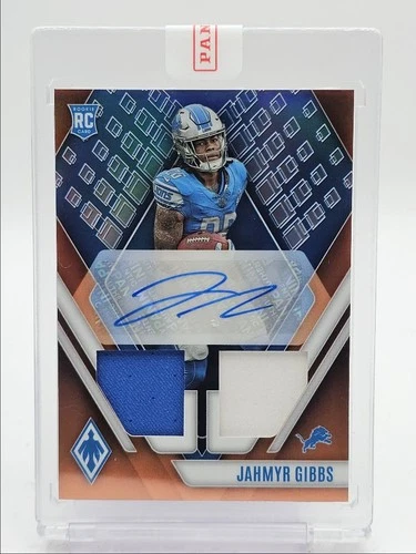 JAHMYR GIBBS 2023 PHOENIX RPA ROOKIE DUAL PATCH ORANGE RC AUTO /125 Q4920