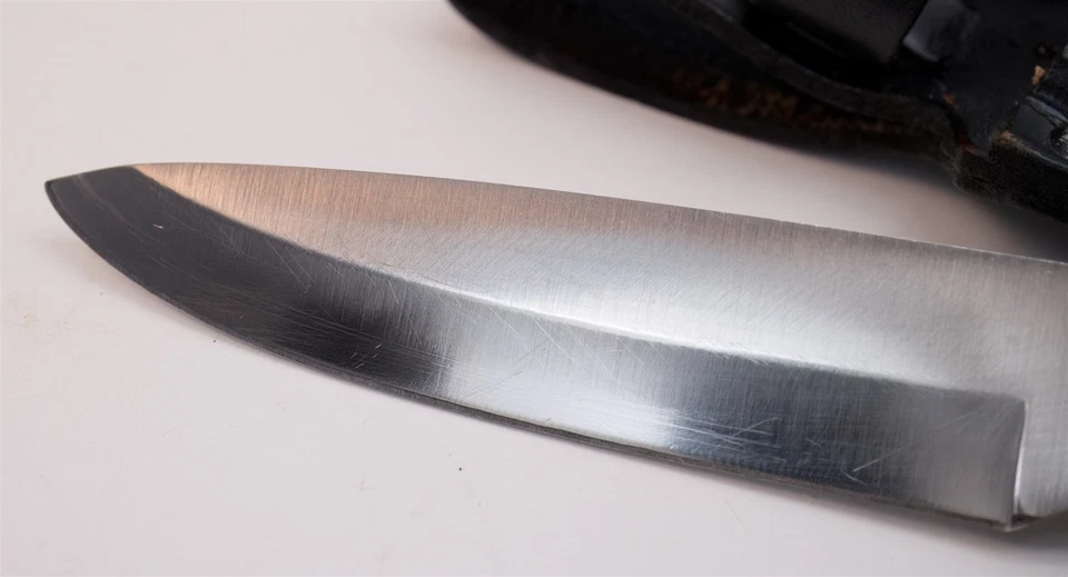 Cuchillo de caza y funda de cuero Remington USA Sportsman negro Kraton Drop Point Foto 4 de 4