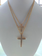 Pretty dual crosses w/ crystals 18 inch necklace. Goldtone