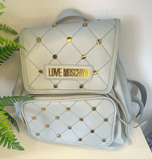 Zaino Love Moschino blu chiaro ecopelle trapuntato borchie logo oro