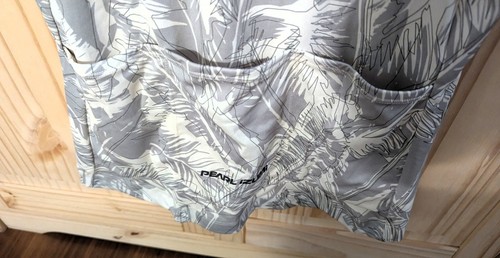Camiseta deportiva sin mangas PEARL IZUMI Attack NUEVA mujer talla M UPF 25 pluma palma - Imagen 7 de 9