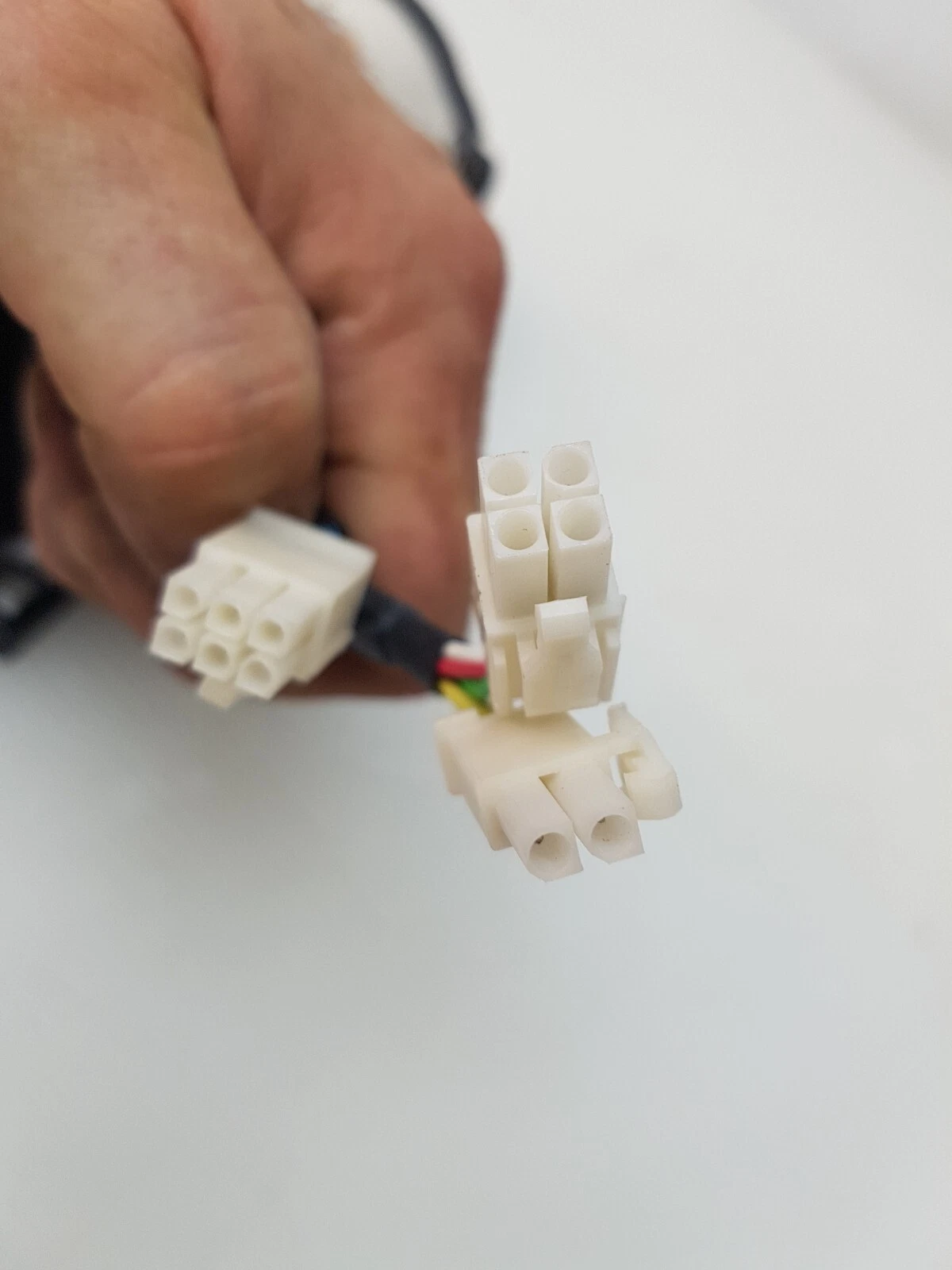White multi-pin connectors on the Panasonic MQMA022P2B motor leads