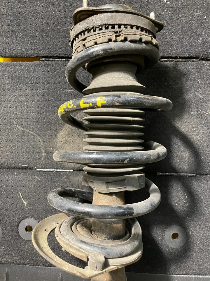 Amortiguador de puntal delantero izquierdo Dodge Grand Caravan 2012-2017 fabricante original de fábrica. Foto 2 de 4