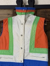 This is a vintage multi-colored ski vest by Brigham Sportswear 80s 