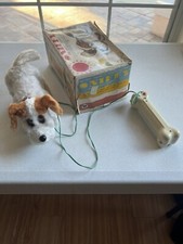 VINTAGE 1960  S SNIFFY THE NOSEY PUPPY BATTERY OPERATED TOY WHICH WORKS VERY CUTE