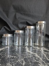 Set Of Four Glass Storage Jars W/ Screw On Lids