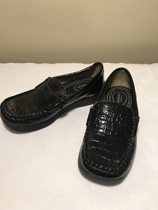 girls black penny loafers