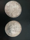QTY. 2........1997 American Silver Eagles .999 Fine Silver. ( come in capsules )