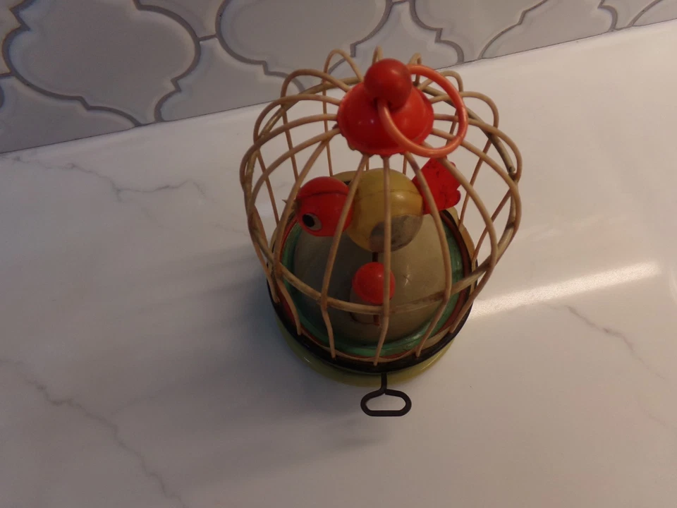 Pájaro cantando celuloide en una jaula sin marca Foto 3 de 4