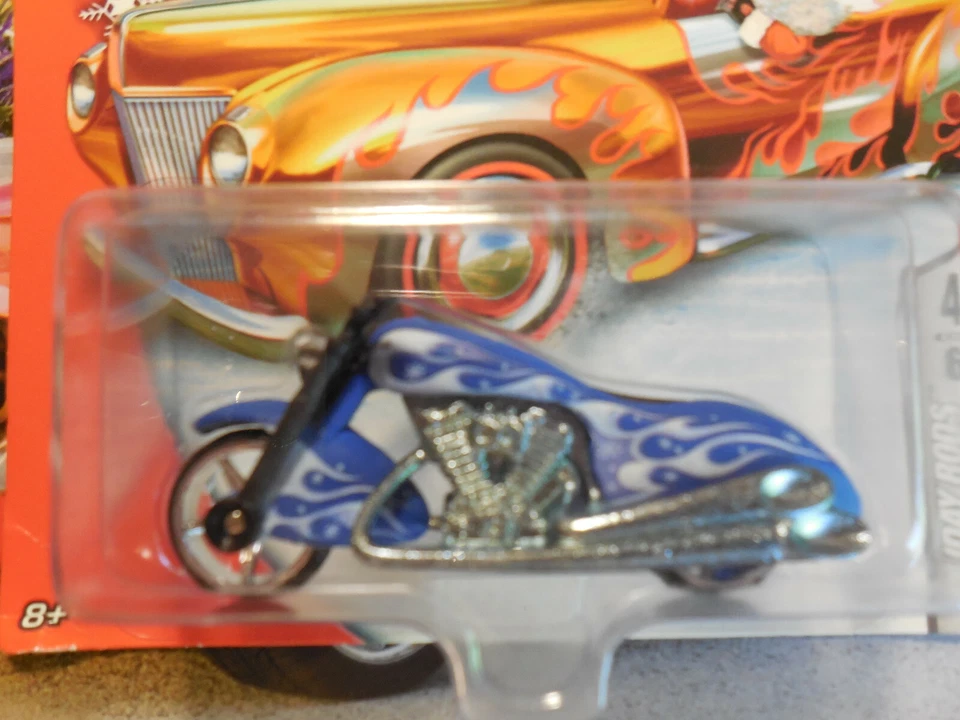 Scooter Hot Wheels Holiday Rods Scorchin' 2007 Blue Flames pilotos reales envío gratuito Foto 2 de 3