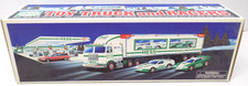 NOS 1997 Hess Toy Truck with Two Race Cars Brand new in the Box.