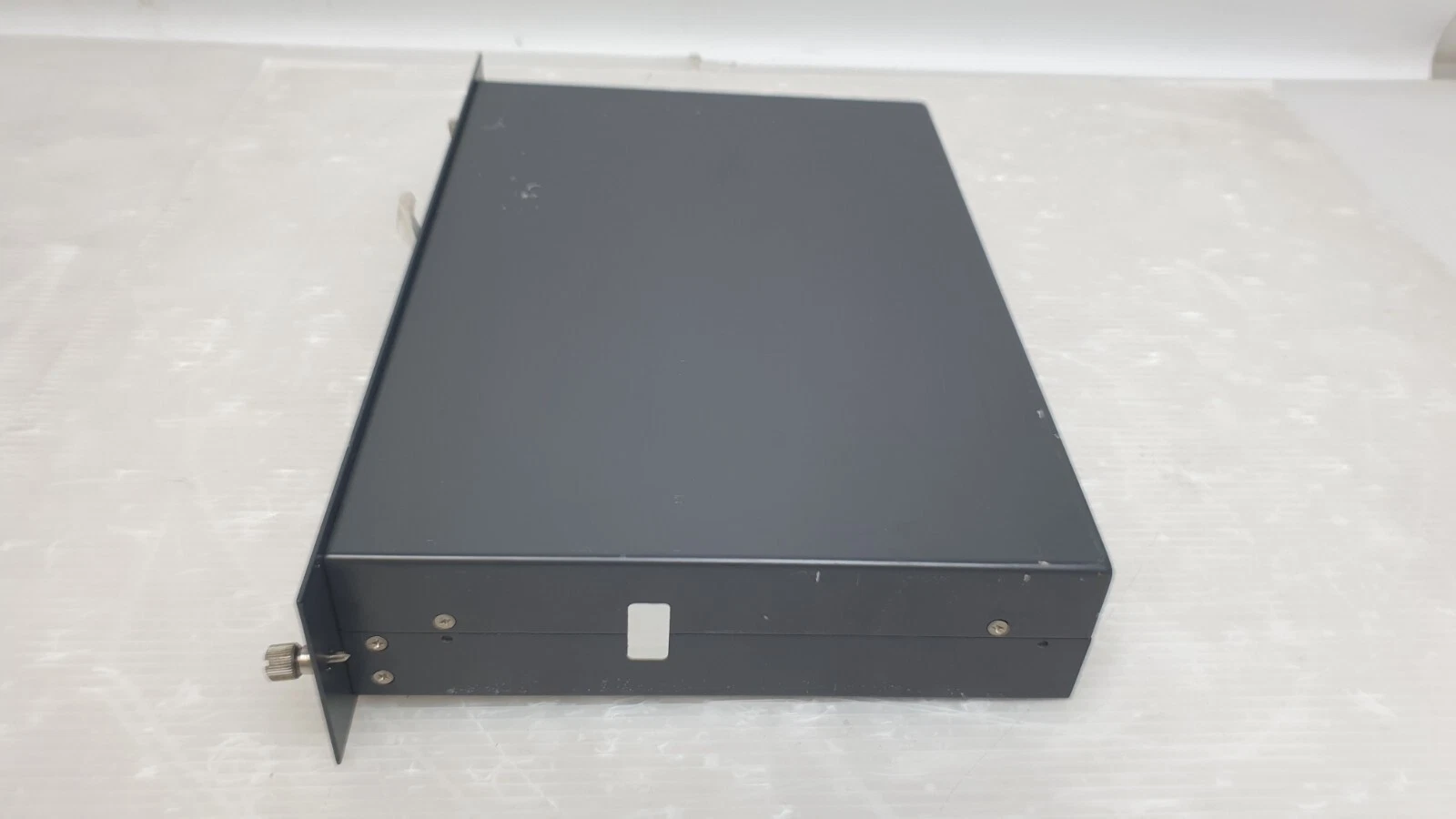 Side view of the Hitachi Kokusai DN-150A housing and front panel