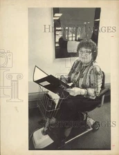 Press Photo Lenore Smith-Miller using a mobility scooter at office in Anchorage