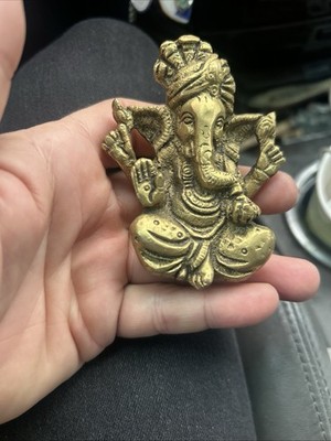 vintage brass sitting elephant with trunk up figurine