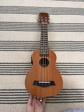 Electric Caramel Ukulele Lightly Played 