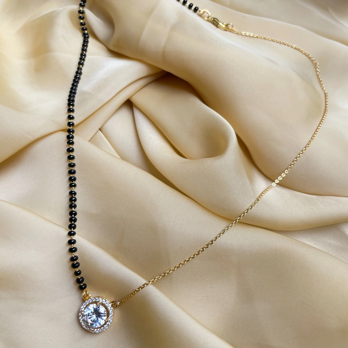 Single stone diamond best sale mangalsutra