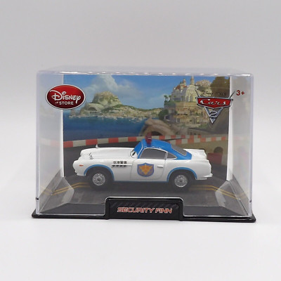 DISNEY PIXAR CARS 2 SECURITY FINN DIE-CAST CAR IN CASE 1:43 DISNEY STORE
