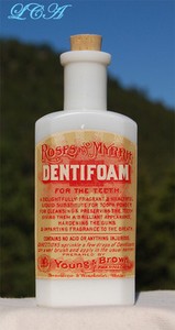 Antique DENTIFOAM liquid dentifrice FOR the TEETH a WHITE MILK GLASS bottle