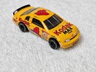 1/64 Action Racing Nascar Chevy Monte Carlo Yellow Kodak No. 4 Sterling Marlin