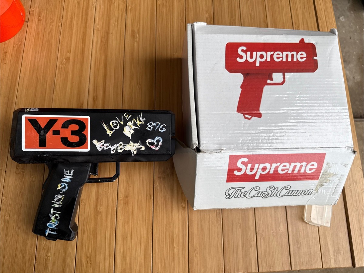 Supreme/CashCannon Money Gun. Includes custom Supreme $1000