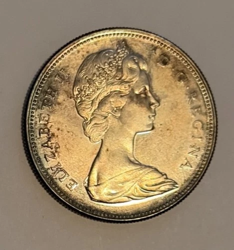 1867-1967 80% SILVER CANADIAN ONE DOLLAR ELIZABETH II D.G.REGINA