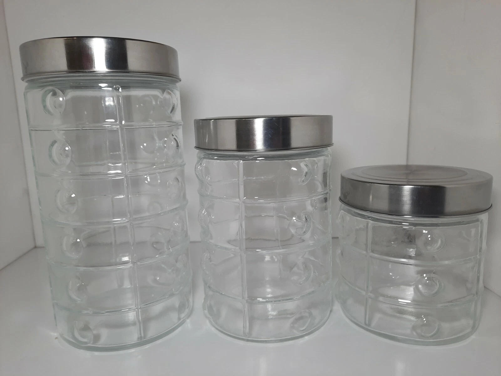 Canister Set of 3 Clear Glass Jars grad Canisters with Silver tone Lids textured