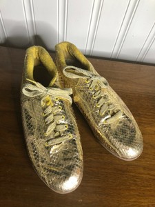 gold tennis shoes womens