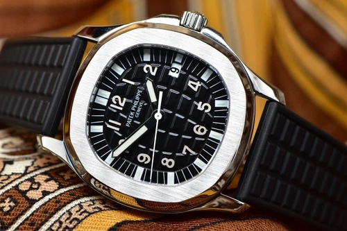 2005 Patek Philippe Aquanaut Midsize 34mm Steel Quartz 5064A with Papers