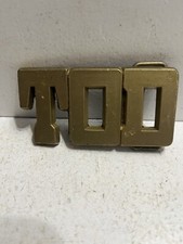 - 1980 s Vintage Brass Colored Belt Buckle Tod Name