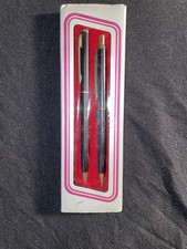 pen and mechanical pencil set with a black finish
