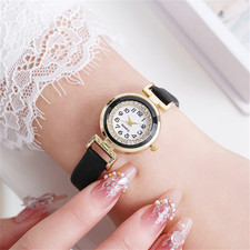 Elegant Women's Gold Crystal Round Watch with Black Leather Strap