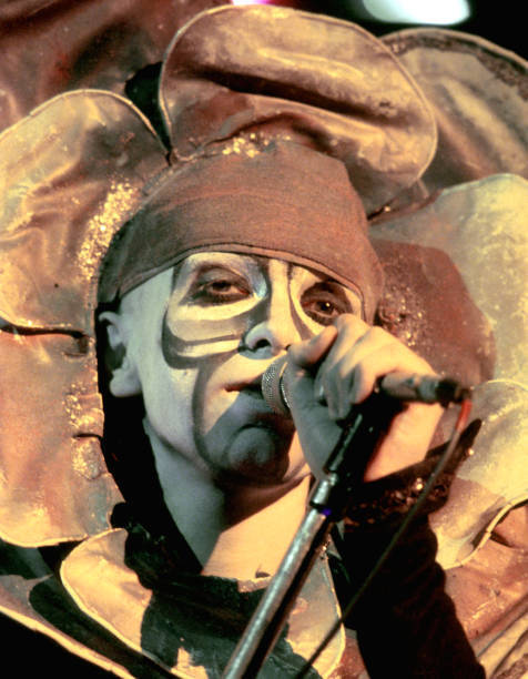 Peter Gabriel of the prog rock band Genesis performs onstage his o- Old Photo