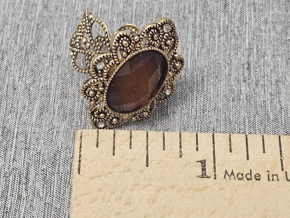 Anillo de cóctel llamativo para mujer ajustable tono dorado filigrana marrón piedra ovalada Foto 3 de 4