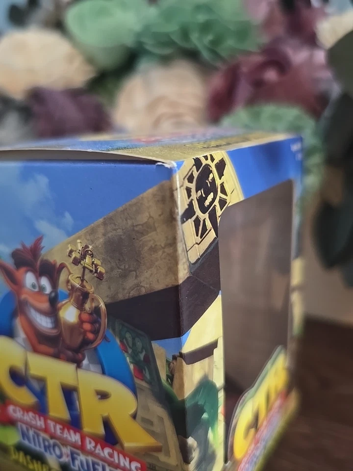 Tablero de instrumentos Crash Team Racing con combustible nitro Bobble GameStop Promo Foto 4 de 4