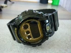 VINTAGE CASIO G-SHOCK QUARTZ WATCH MENS DIGITAL BLACK & GOLD NEW BATTERY