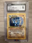 1999 Pokemon Machamp 1st Edition CGC 9 Mint Holo #8 Base Set