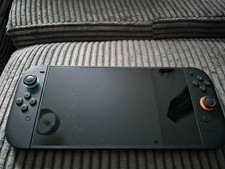 Image of Nintendo Switch Switch 2 Console with two games, a screen protector and case