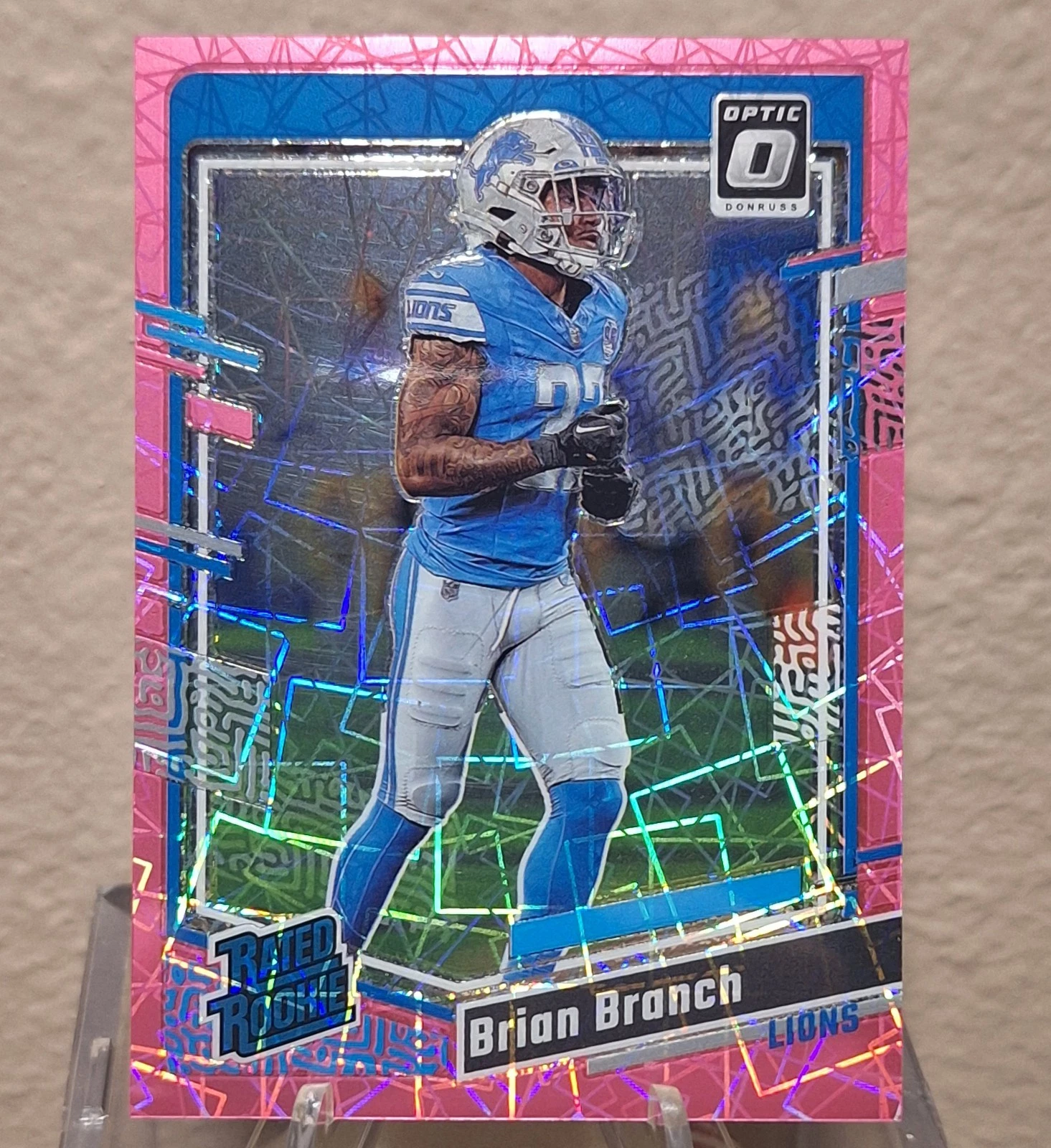 2023 Donruss Optic #233 Brian Branch - Pink Velocity Rated Rookie  /79 RC LIONS