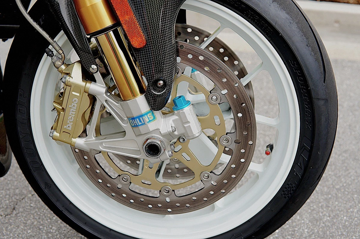 2004 Aprilia Tuono Racing MK1 - right front wheel, with Ohlins fork, Brembo brake caliper and drilled rotor