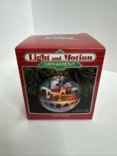 1986 Hallmark Light and Motion Village Express Christmas Train Ornament