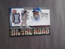 2002 FLEER ULTRA ON THE ROAD JERSEY CARD CARLOS DELGADO TORONTO BLUE JAYS