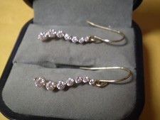 Pair of 14K Yellow Gold Ladies 7 Cubic Zirconia Row Earrings    1.6 grams