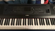 Yamaha Piano with Wooden Stand, 3 Pedals & Sheet Music Stand Excellent Condition