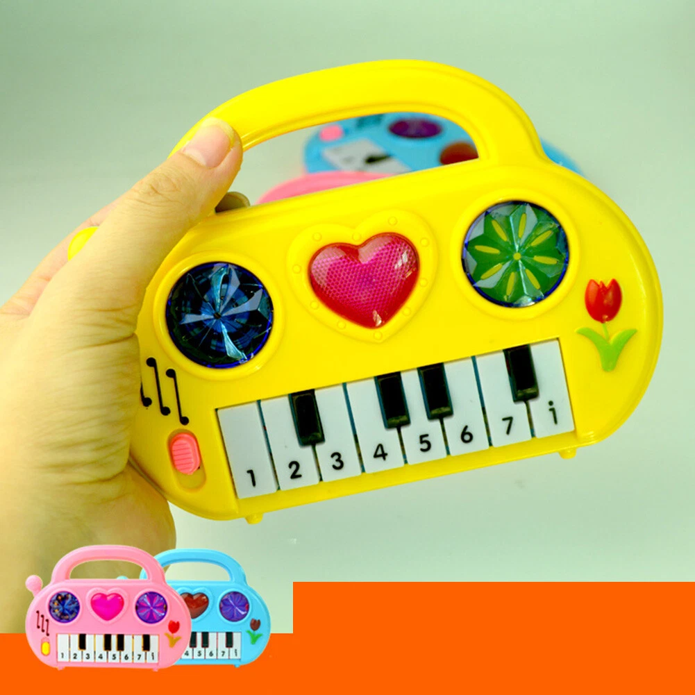 Baby deals piano keyboard