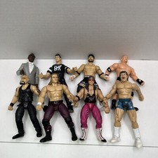 WWE Wrestling Lot Of 8 Action Figures Bret Hart Shane McMahon SEE PHOTOS