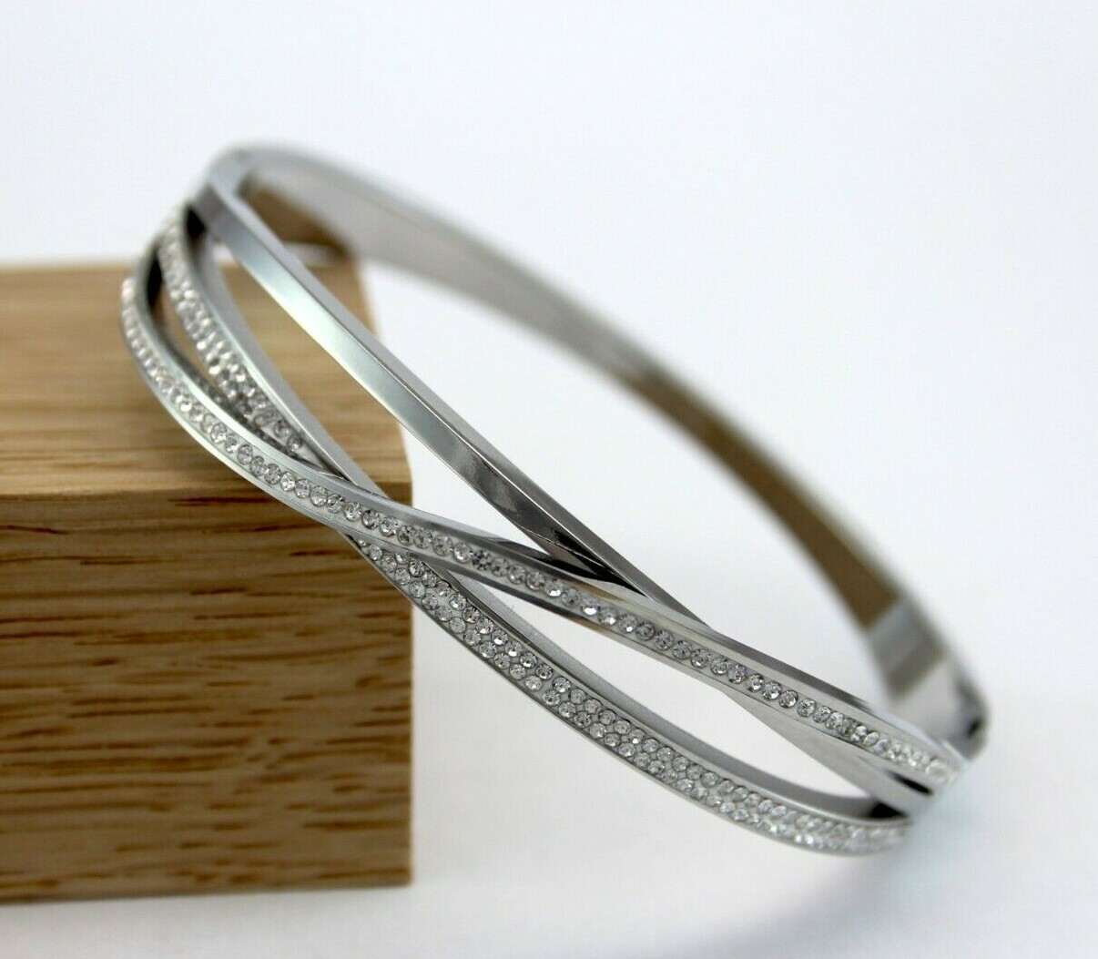 Women's silver stainless steel CZ studded crisscross bangle bracelet 6.5 inch-image
