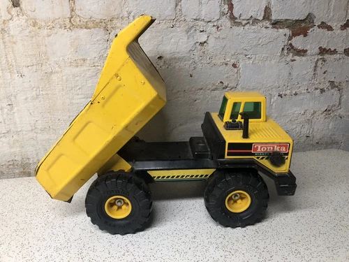 Vintage XMB-975 Tonka Mighty Diesel Yellow Dump Truck Pressed Steel