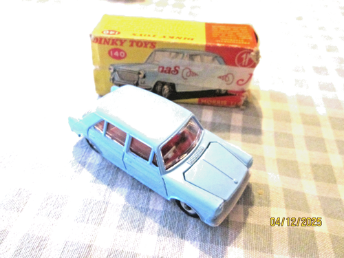 DINKY: A circa 1950s Dinky Toys, Morris Oxford saloon (#159), green with green hubs, in