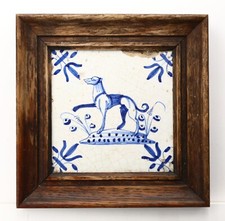 First Half of 17th Century Framed Delft Tile With Dog and Lily Corner Motif