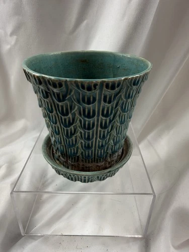 Vintage Nelson McCoy pottery planter with a fish scale design in an aqua glaze.